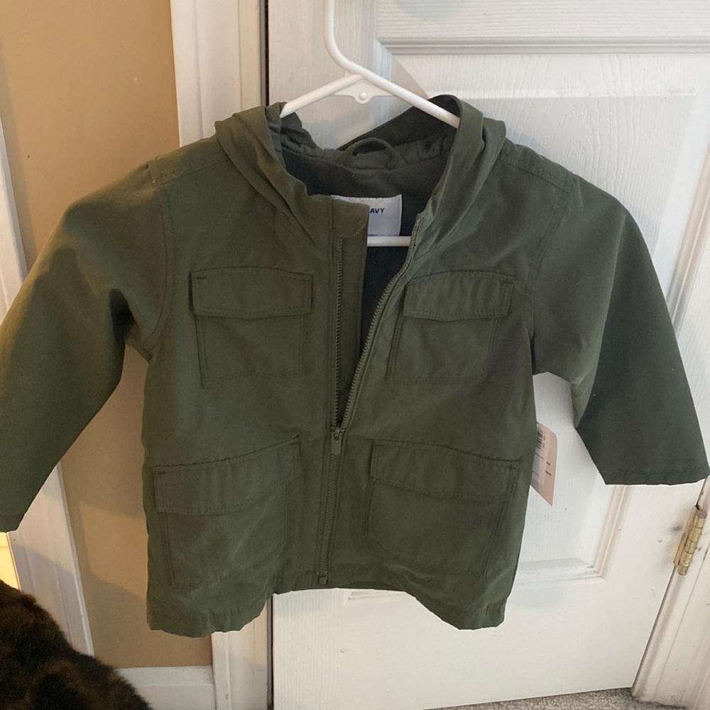 Kids rain jacket/ never worn/ hunter green